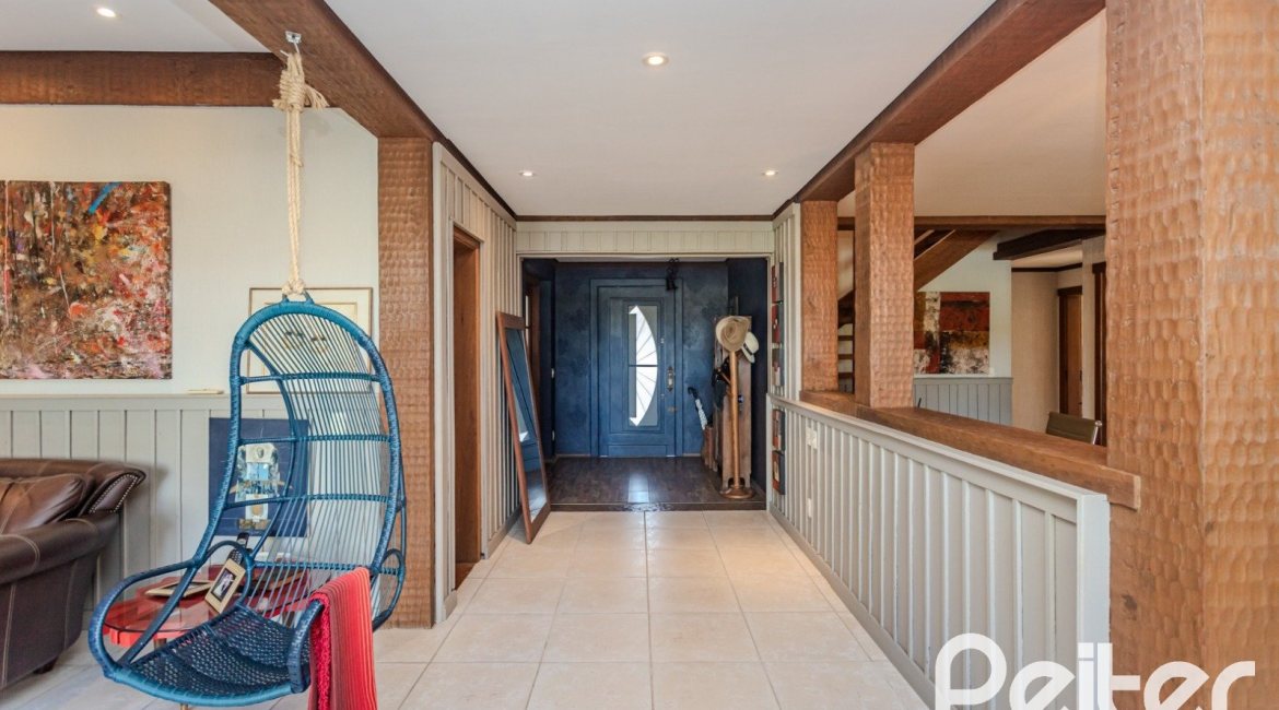 Casa em Condomínio à venda com 450m², 6 dormitórios, 4 suítes, 2 vagas, no bairro Terra Ville em PORTO ALEGRE