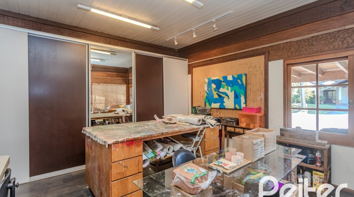 Casa em Condomínio à venda com 450m², 6 dormitórios, 4 suítes, 2 vagas, no bairro Terra Ville em PORTO ALEGRE