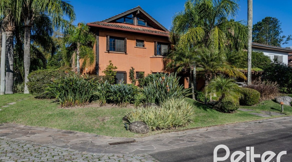 Casa em Condomínio à venda com 450m², 6 dormitórios, 4 suítes, 2 vagas, no bairro Terra Ville em PORTO ALEGRE