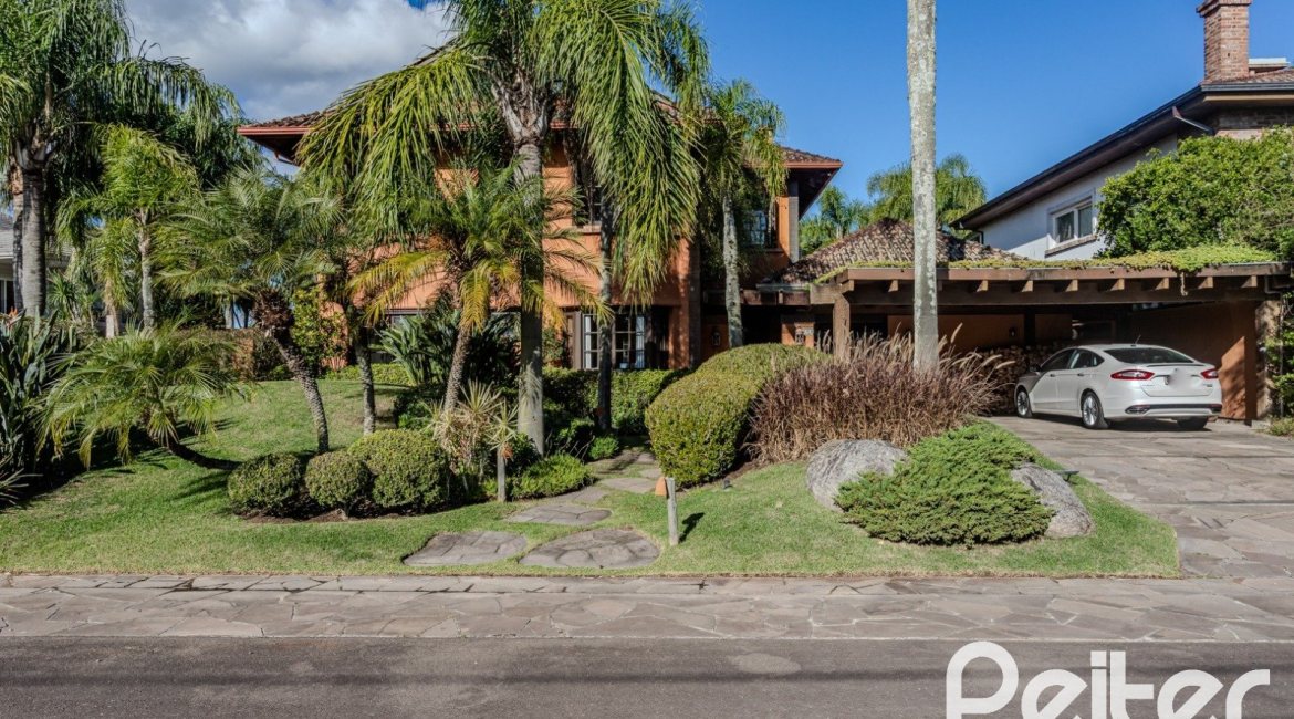 Casa em Condomínio à venda com 450m², 6 dormitórios, 4 suítes, 2 vagas, no bairro Terra Ville em PORTO ALEGRE