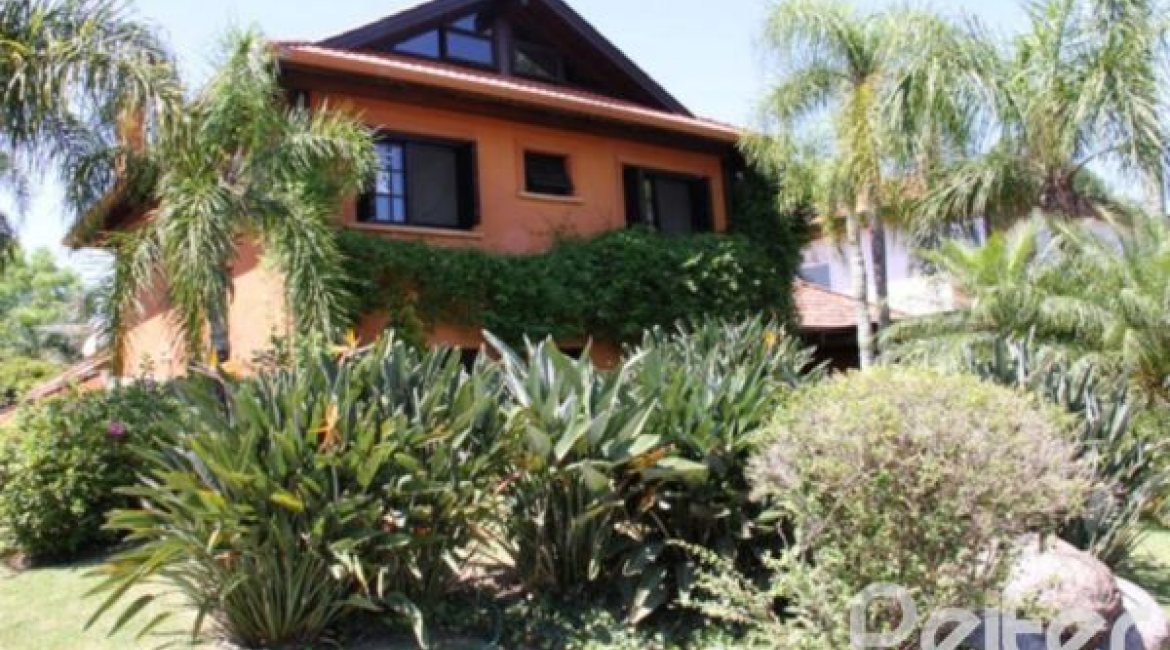 Casa em Condomínio à venda com 450m², 6 dormitórios, 4 suítes, 2 vagas, no bairro Terra Ville em Porto Alegre