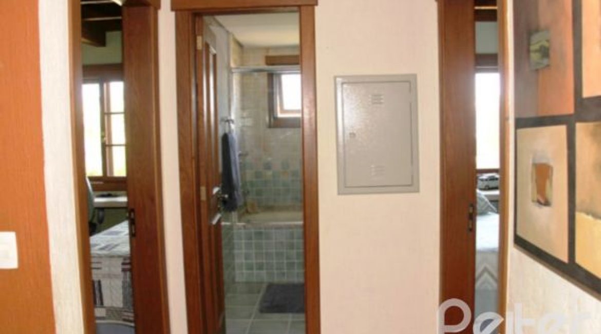 Casa em Condomínio à venda com 450m², 6 dormitórios, 4 suítes, 2 vagas, no bairro Terra Ville em Porto Alegre