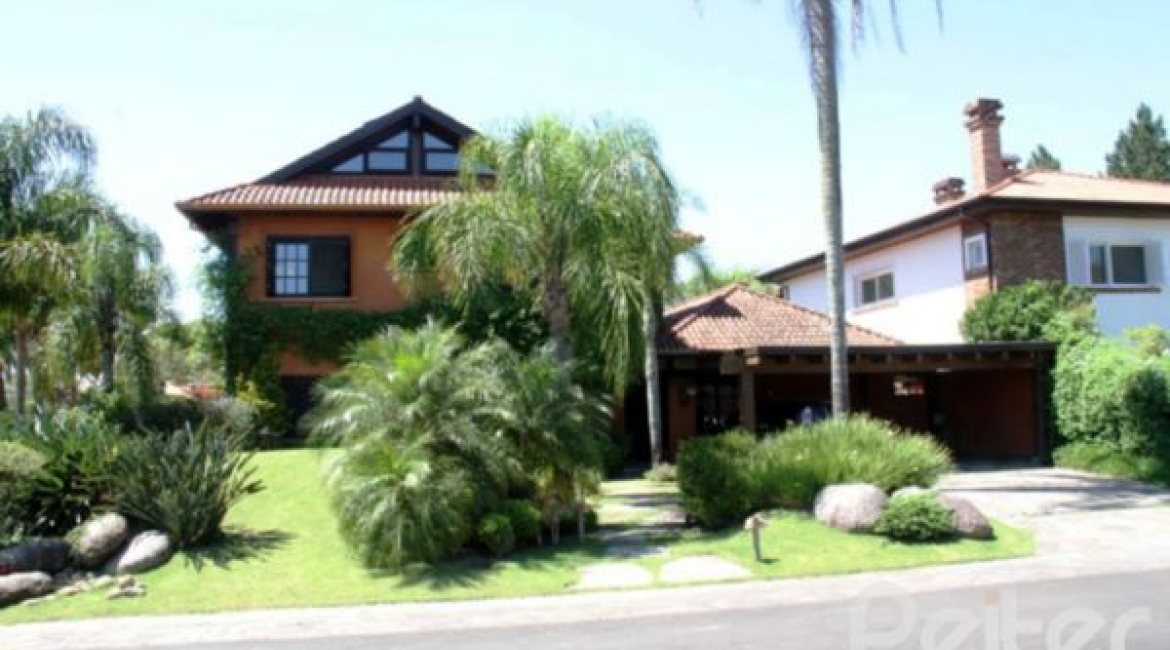 Casa em Condomínio à venda com 450m², 6 dormitórios, 4 suítes, 2 vagas, no bairro Terra Ville em Porto Alegre