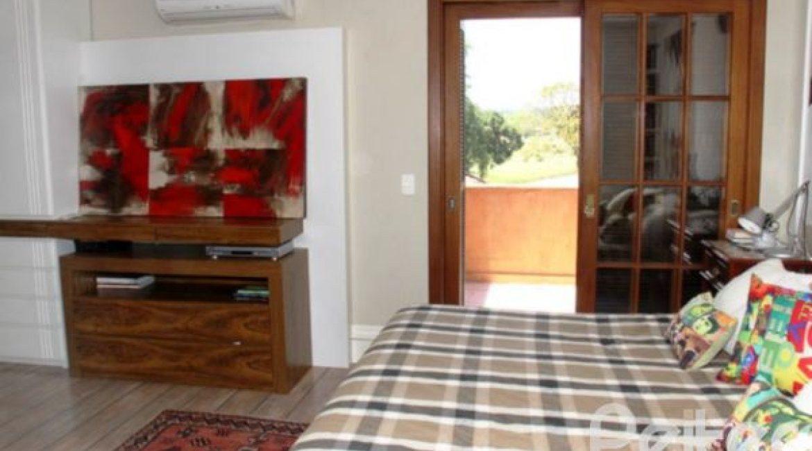 Casa em Condomínio à venda com 450m², 6 dormitórios, 4 suítes, 2 vagas, no bairro Terra Ville em Porto Alegre