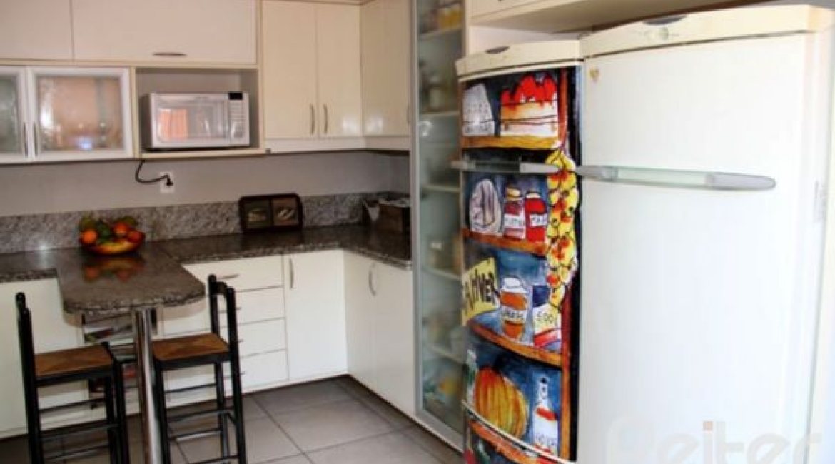 Casa em Condomínio à venda com 450m², 6 dormitórios, 4 suítes, 2 vagas, no bairro Terra Ville em Porto Alegre