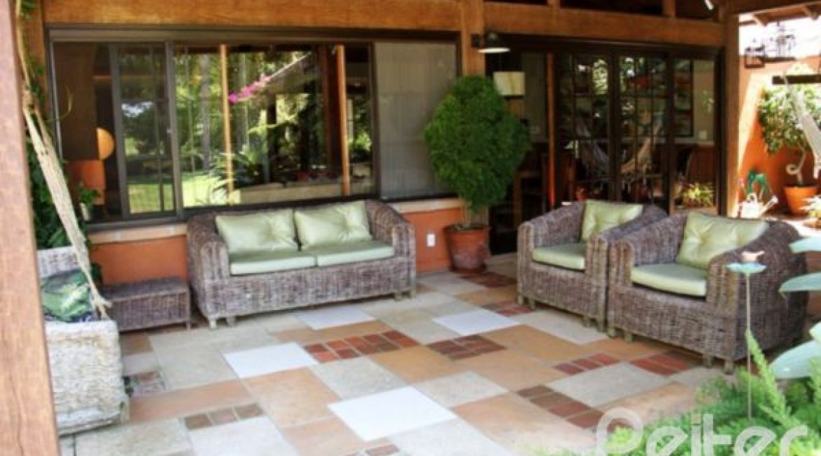 Casa em Condomínio à venda com 450m², 6 dormitórios, 4 suítes, 2 vagas, no bairro Terra Ville em Porto Alegre