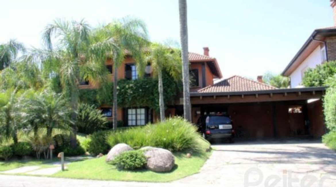 Casa em Condomínio à venda com 450m², 6 dormitórios, 4 suítes, 2 vagas, no bairro Terra Ville em Porto Alegre