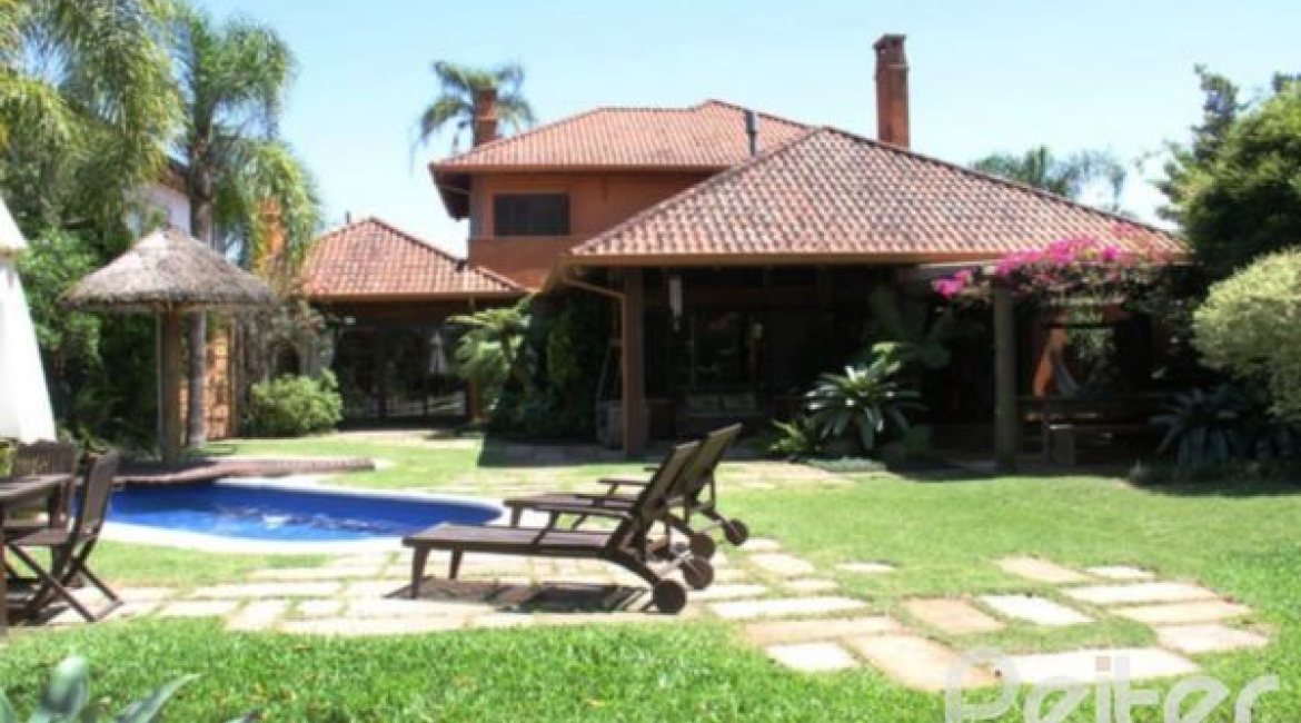 Casa em Condomínio à venda com 450m², 6 dormitórios, 4 suítes, 2 vagas, no bairro Terra Ville em Porto Alegre