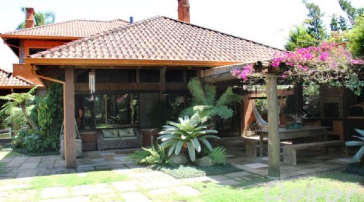 Casa em Condomínio à venda com 450m², 6 dormitórios, 4 suítes, 2 vagas, no bairro Terra Ville em Porto Alegre