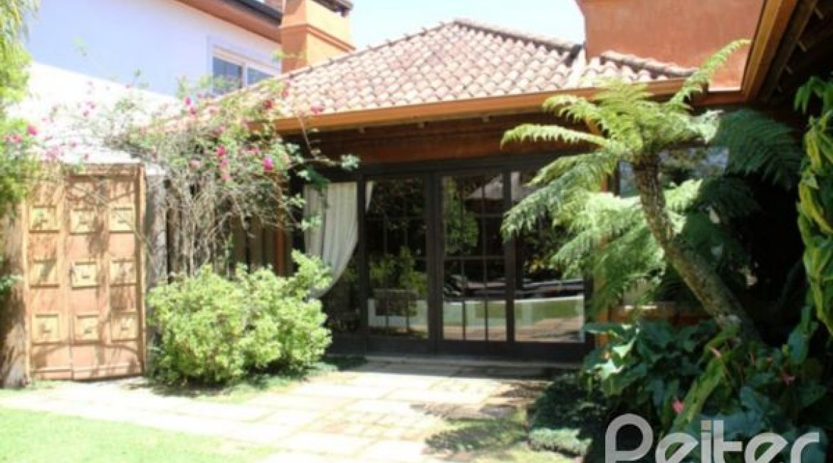 Casa em Condomínio à venda com 450m², 6 dormitórios, 4 suítes, 2 vagas, no bairro Terra Ville em Porto Alegre