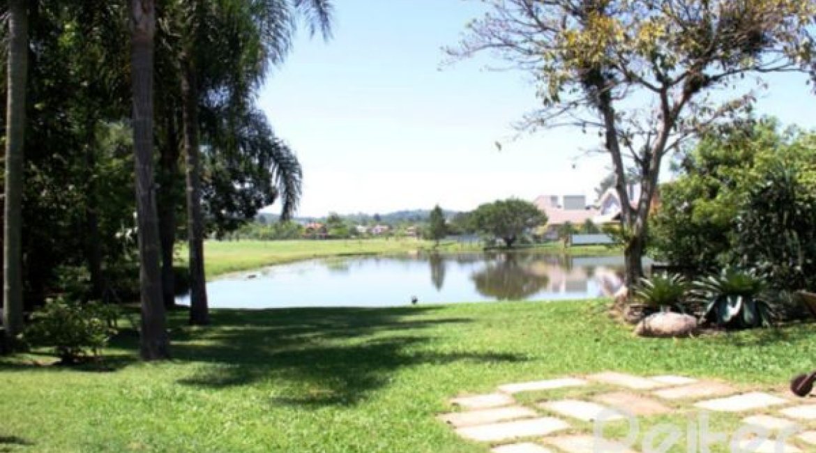 Casa em Condomínio à venda com 450m², 6 dormitórios, 4 suítes, 2 vagas, no bairro Terra Ville em Porto Alegre