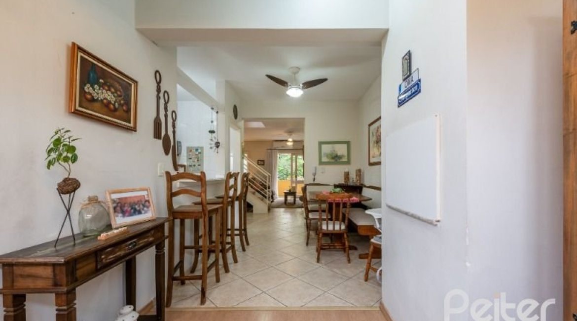 Casa em Condomínio à venda com 159m², 3 dormitórios, 1 suíte, 2 vagas, no bairro Tristeza em Porto Alegre