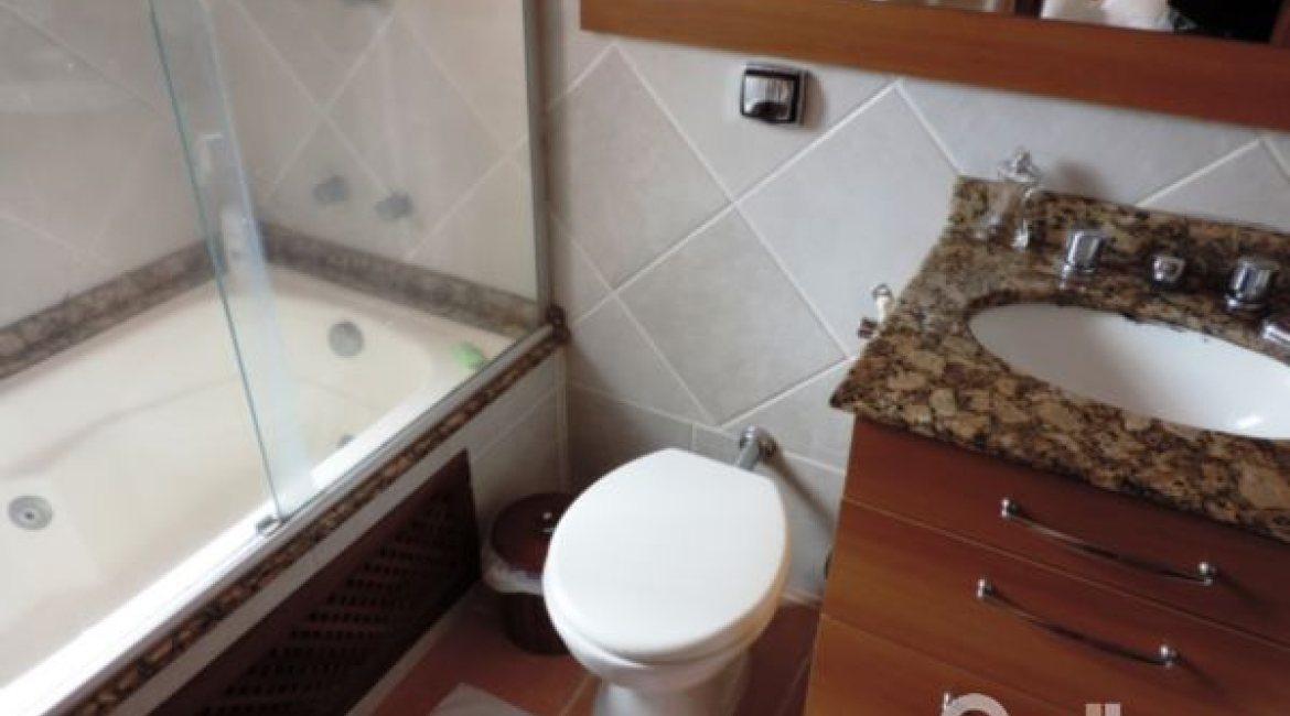 Casa em Condomínio à venda com 194m², 3 dormitórios, 1 suíte, 2 vagas, no bairro Vila Assunção em Porto Alegre