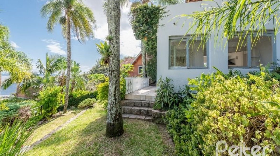 Casa à venda com 347m², 3 dormitórios, 3 suítes, 3 vagas, no bairro Sétimo Céu em Porto Alegre
