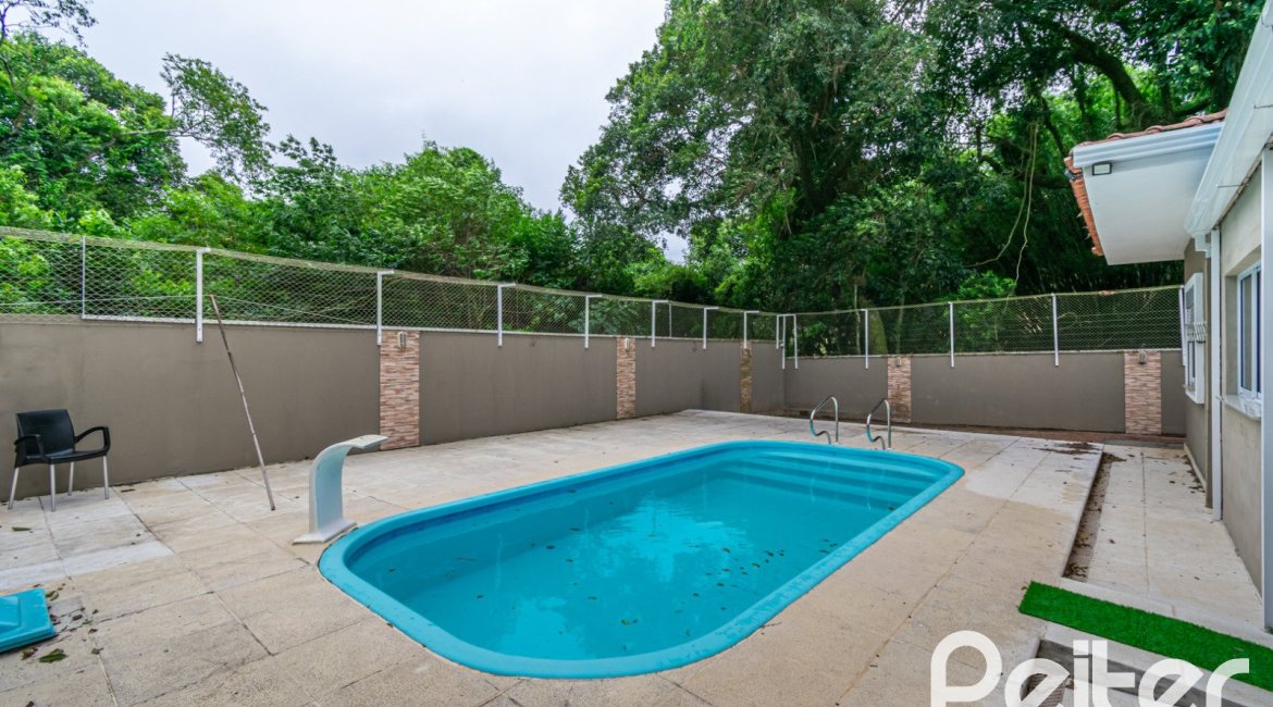 Casa em Condomínio à venda com 213m², 4 dormitórios, 3 suítes, 4 vagas, no bairro Vila Nova em Porto Alegre