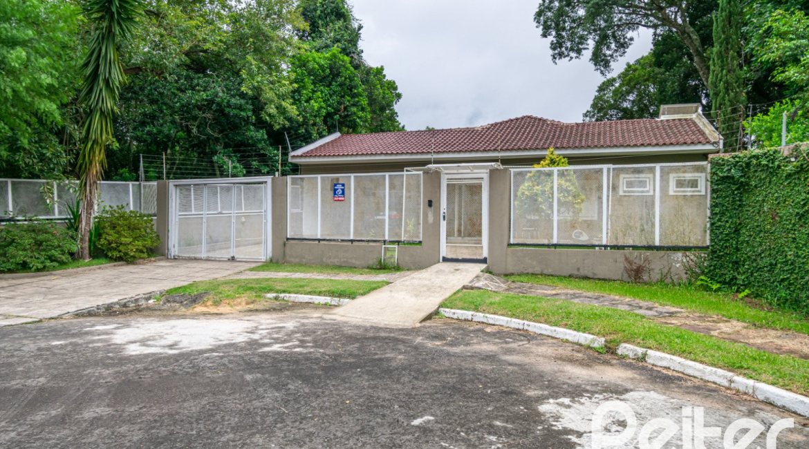 Casa em Condomínio à venda com 213m², 4 dormitórios, 3 suítes, 4 vagas, no bairro Vila Nova em Porto Alegre