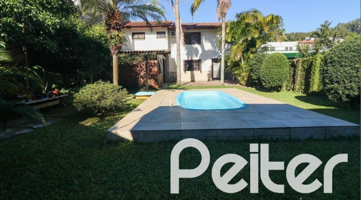 Casa à venda com 179m², 3 dormitórios, 1 suíte, 3 vagas, no bairro Tristeza em Porto Alegre