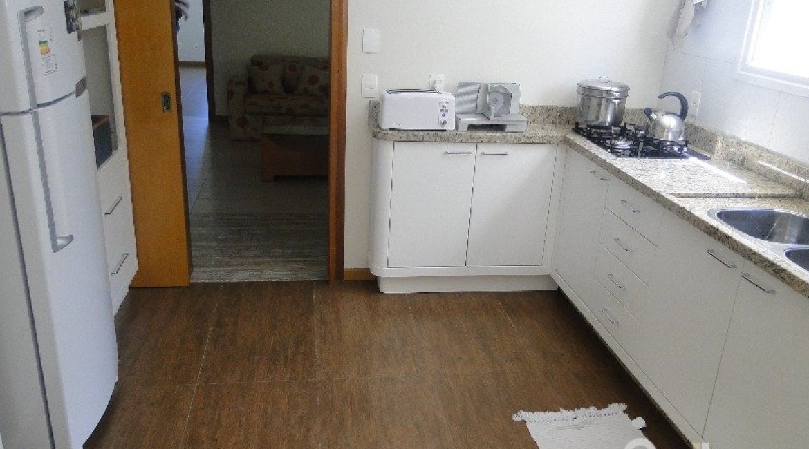 Casa em Condomínio à venda com 288m², 4 dormitórios, 2 suítes, 2 vagas, no bairro Knorr em Porto Alegre