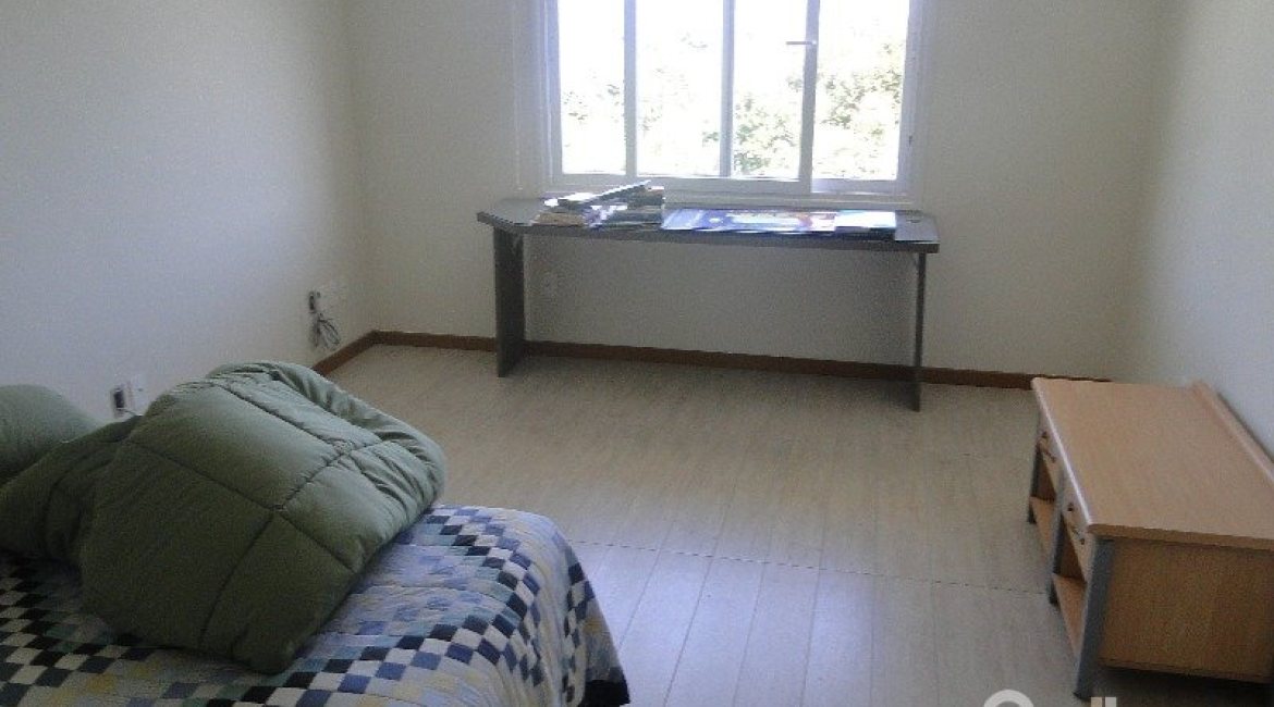 Casa em Condomínio à venda com 288m², 4 dormitórios, 2 suítes, 2 vagas, no bairro Knorr em Porto Alegre