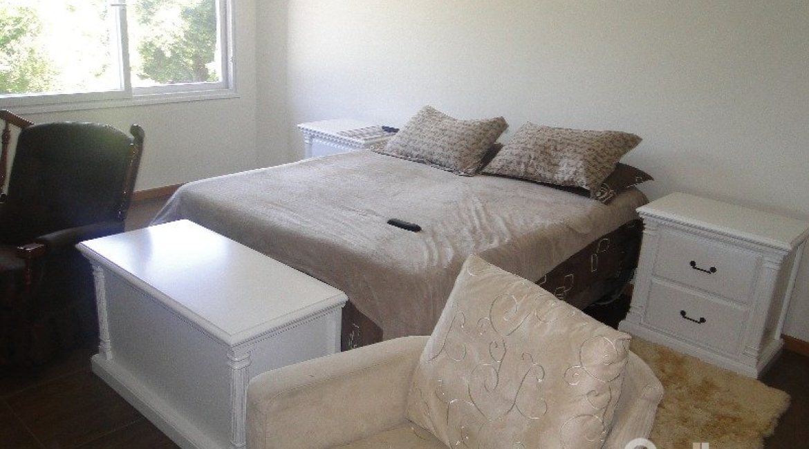 Casa em Condomínio à venda com 288m², 4 dormitórios, 2 suítes, 2 vagas, no bairro Knorr em Porto Alegre