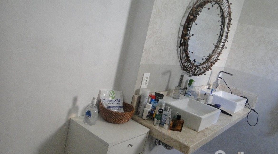 Casa em Condomínio à venda com 288m², 4 dormitórios, 2 suítes, 2 vagas, no bairro Knorr em Porto Alegre