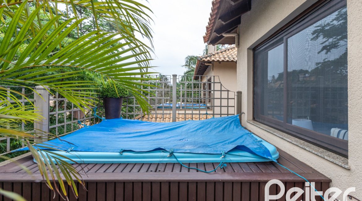 Casa em Condomínio à venda com 339m², 3 dormitórios, 1 suíte, 3 vagas, no bairro Tristeza em PORTO ALEGRE