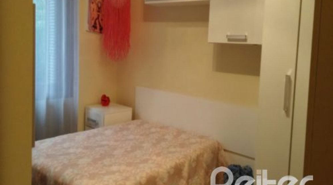 Casa em Condomínio à venda com 122m², 3 dormitórios, 1 suíte, 2 vagas, no bairro Cristal em Porto Alegre