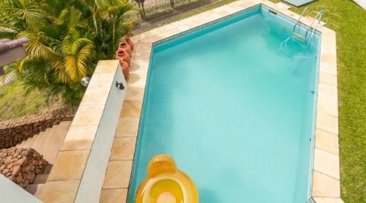 Casa à venda com 456m², 3 dormitórios, 3 suítes, 5 vagas, no bairro Vila Assunção em Porto Alegre