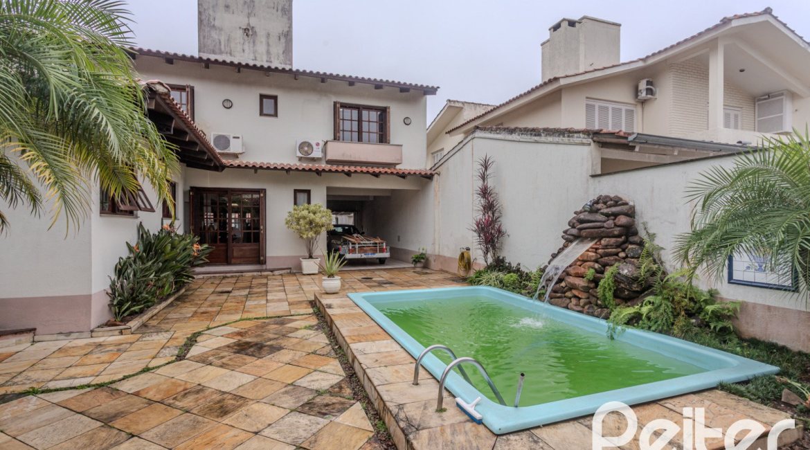 Casa à venda com 290m², 3 dormitórios, 1 suíte, 2 vagas, no bairro Ipanema em Porto Alegre