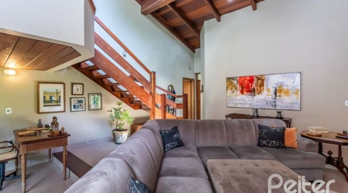 Casa em Condomínio à venda com 600m², 5 dormitórios, 5 suítes, 4 vagas, no bairro Cavalhada em Porto Alegre