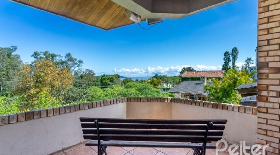 Casa em Condomínio à venda com 600m², 5 dormitórios, 5 suítes, 4 vagas, no bairro Cavalhada em Porto Alegre