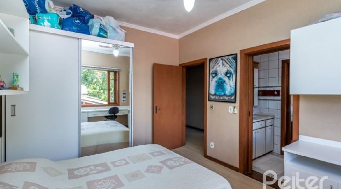 Casa em Condomínio à venda com 600m², 5 dormitórios, 5 suítes, 4 vagas, no bairro Cavalhada em Porto Alegre