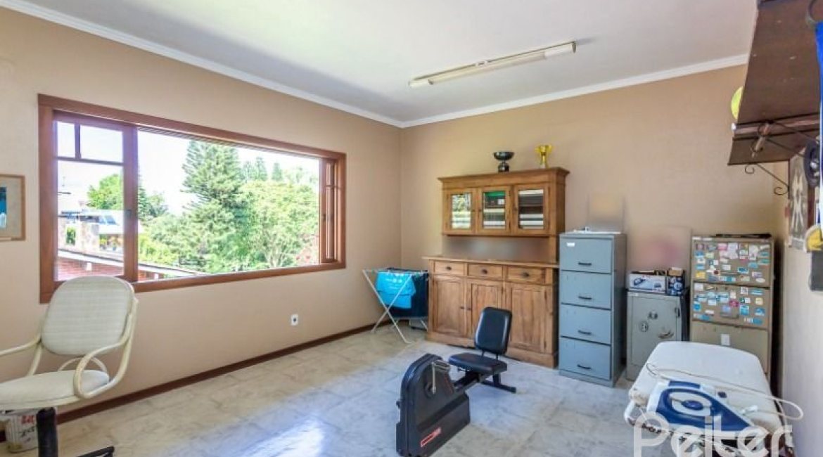 Casa em Condomínio à venda com 600m², 5 dormitórios, 5 suítes, 4 vagas, no bairro Cavalhada em Porto Alegre