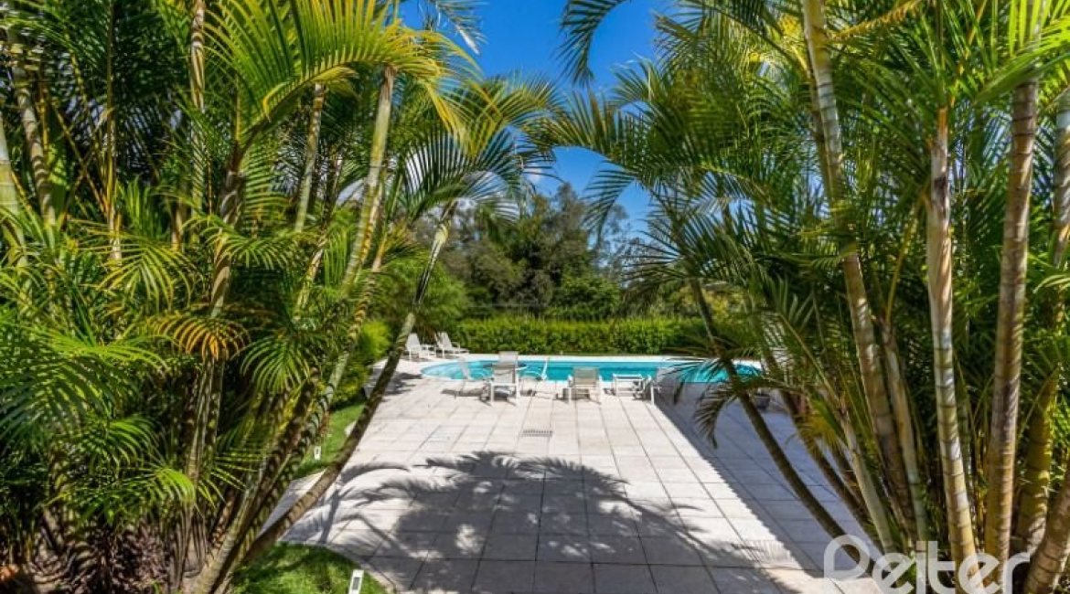 Casa em Condomínio à venda com 600m², 5 dormitórios, 5 suítes, 4 vagas, no bairro Cavalhada em Porto Alegre