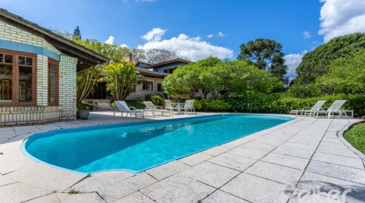 Casa em Condomínio à venda com 600m², 5 dormitórios, 5 suítes, 4 vagas, no bairro Cavalhada em Porto Alegre