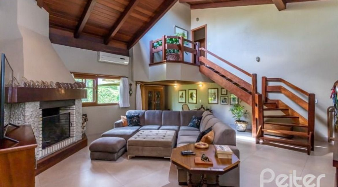 Casa em Condomínio à venda com 600m², 5 dormitórios, 5 suítes, 4 vagas, no bairro Cavalhada em Porto Alegre