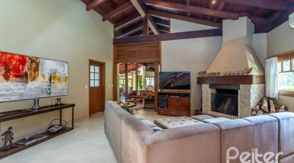 Casa em Condomínio à venda com 600m², 5 dormitórios, 5 suítes, 4 vagas, no bairro Cavalhada em Porto Alegre