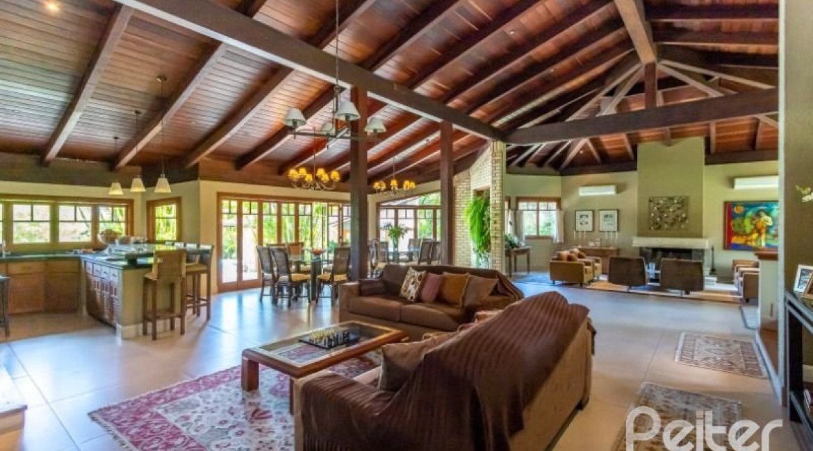 Casa em Condomínio à venda com 600m², 5 dormitórios, 5 suítes, 4 vagas, no bairro Cavalhada em Porto Alegre