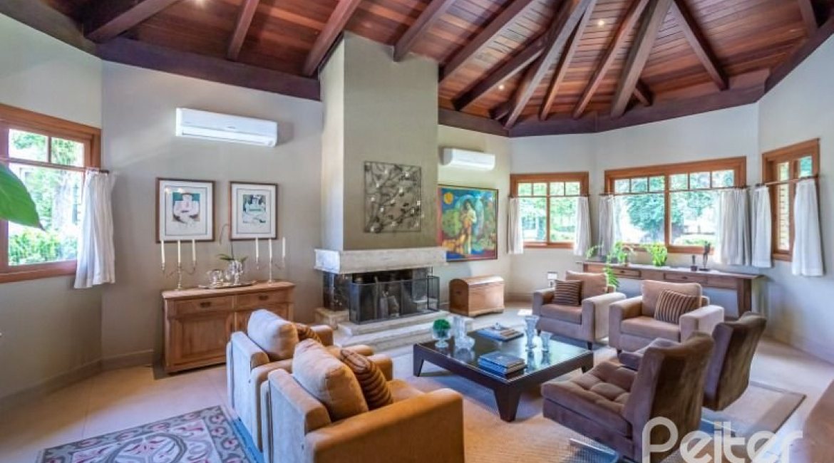 Casa em Condomínio à venda com 600m², 5 dormitórios, 5 suítes, 4 vagas, no bairro Cavalhada em Porto Alegre