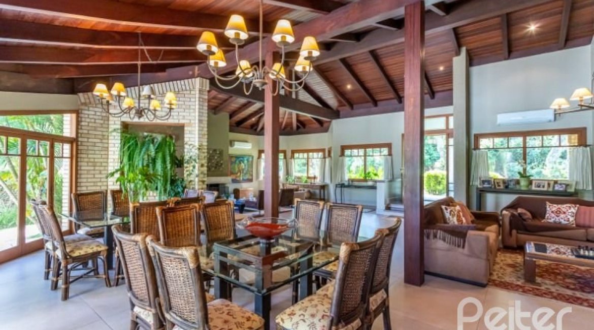 Casa em Condomínio à venda com 600m², 5 dormitórios, 5 suítes, 4 vagas, no bairro Cavalhada em Porto Alegre