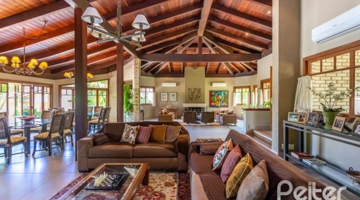 Casa em Condomínio à venda com 600m², 5 dormitórios, 5 suítes, 4 vagas, no bairro Cavalhada em Porto Alegre