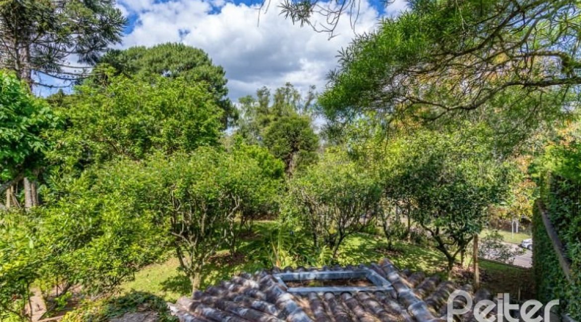 Casa em Condomínio à venda com 600m², 5 dormitórios, 5 suítes, 4 vagas, no bairro Cavalhada em Porto Alegre