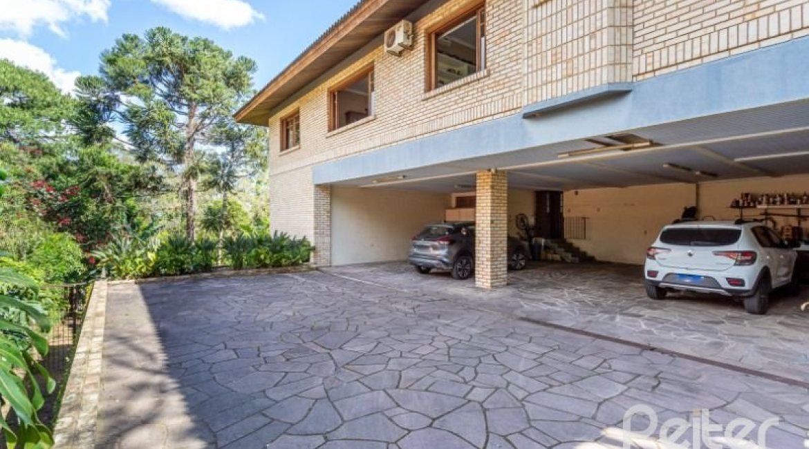 Casa em Condomínio à venda com 600m², 5 dormitórios, 5 suítes, 4 vagas, no bairro Cavalhada em Porto Alegre