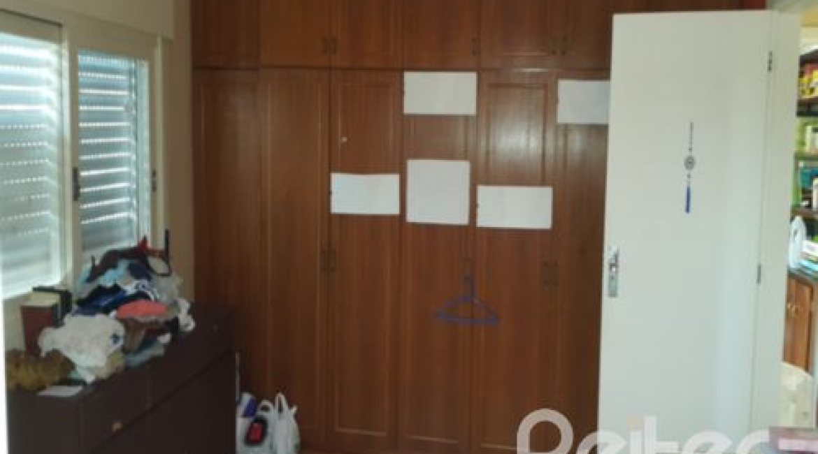 Casa à venda com 428m², 5 dormitórios, 4 suítes, 8 vagas, no bairro Vila Assunção em Porto Alegre