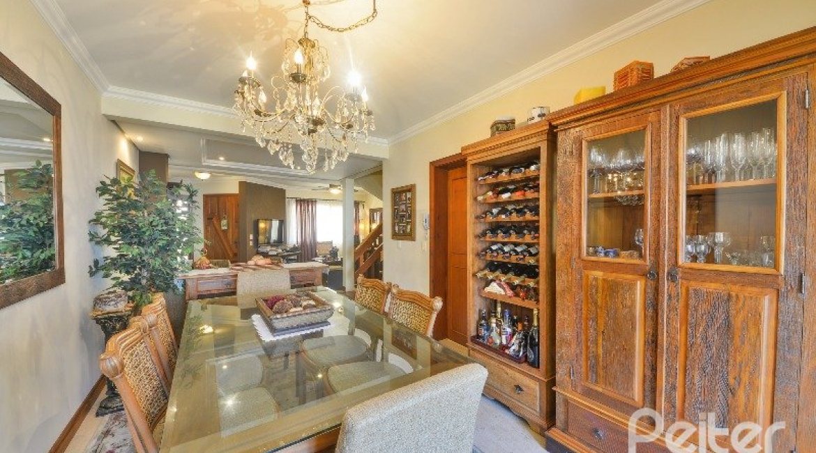 Casa em Condomínio à venda com 252m², 3 dormitórios, 1 suíte, 3 vagas, no bairro Tristeza em Porto Alegre