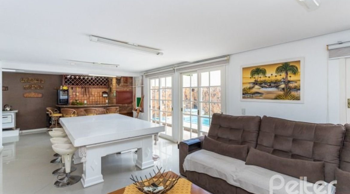 Casa em Condomínio à venda com 290m², 4 dormitórios, 2 suítes, 2 vagas, no bairro Ipanema em Porto Alegre