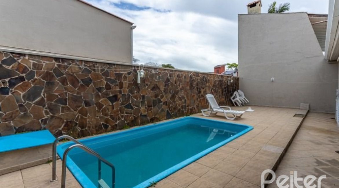 Casa em Condomínio à venda com 290m², 4 dormitórios, 2 suítes, 2 vagas, no bairro Ipanema em Porto Alegre