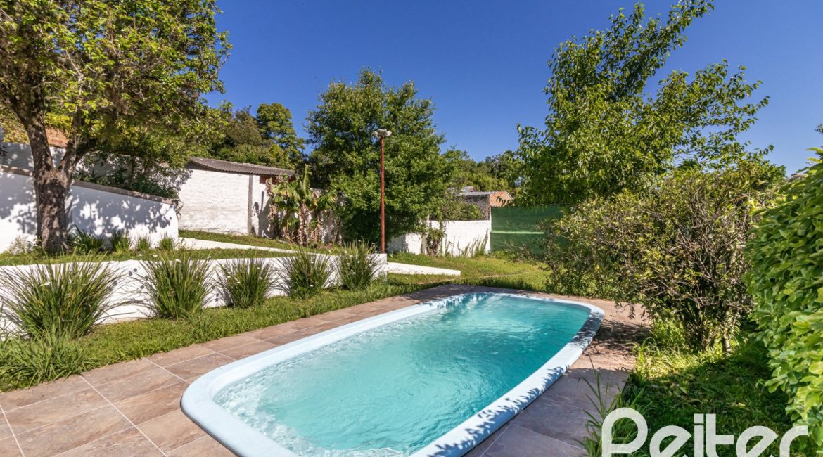 Casa à venda com 380m², 4 dormitórios, 4 suítes, 3 vagas, no bairro Vila Assunção em Porto Alegre