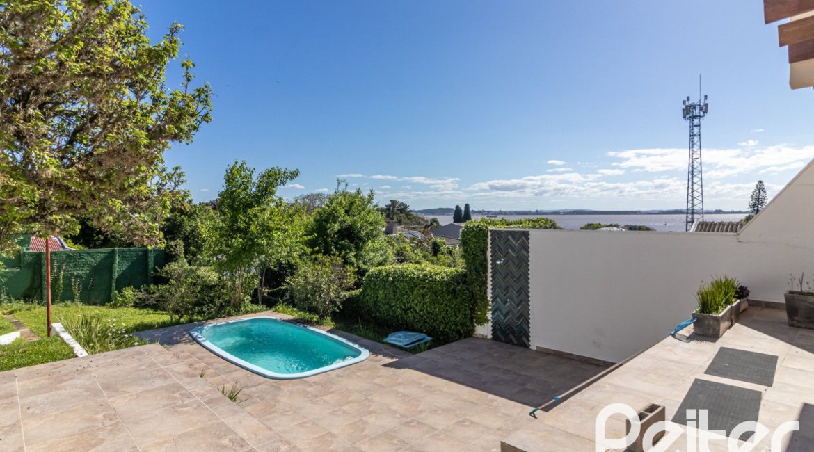 Casa à venda com 380m², 4 dormitórios, 4 suítes, 3 vagas, no bairro Vila Assunção em Porto Alegre