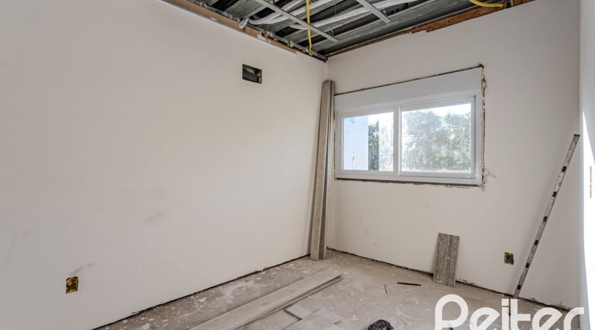 Casa em Condomínio à venda com 237m², 4 dormitórios, 4 suítes, 3 vagas, no bairro Vila Assunção em Porto Alegre